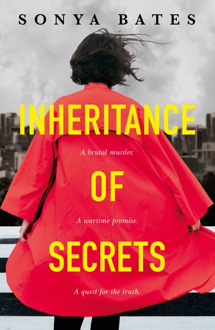 Reverse of a dark haired woman in a red jacket